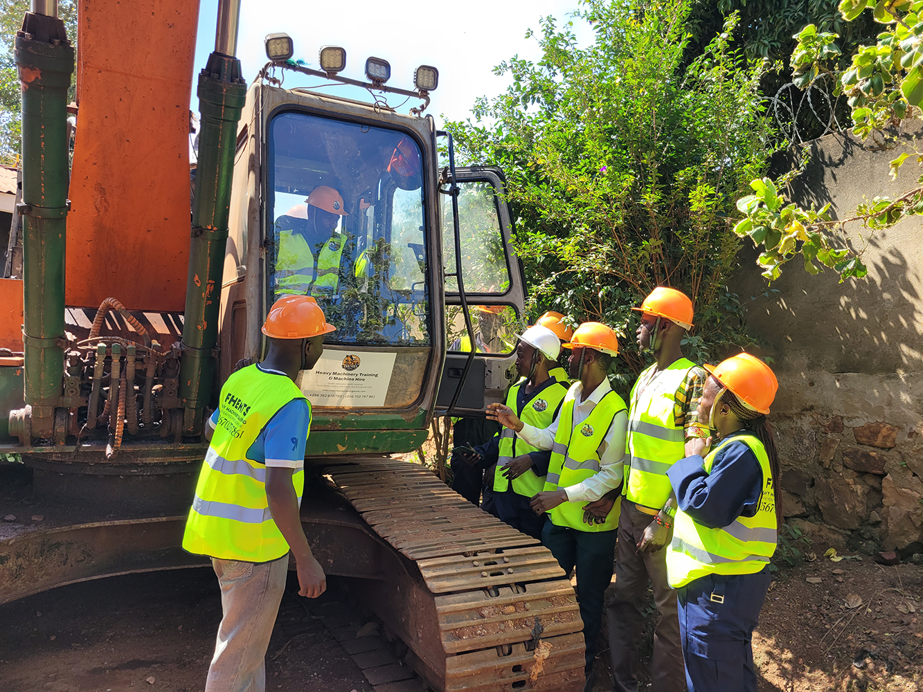 Trainees conducting safety protocols and pre-operational checks