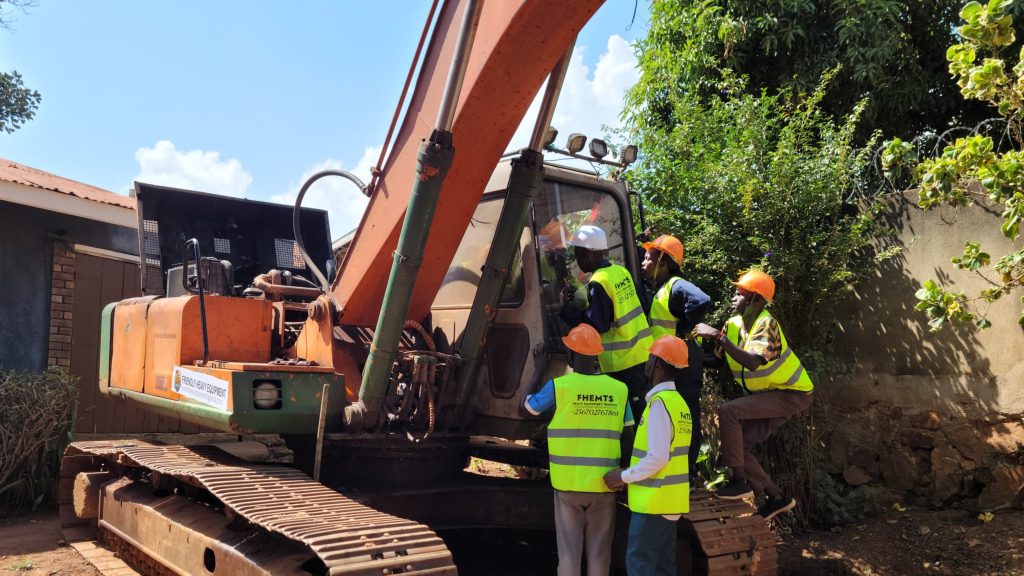 Trainees Practically Learning how to Maintain an Excavator