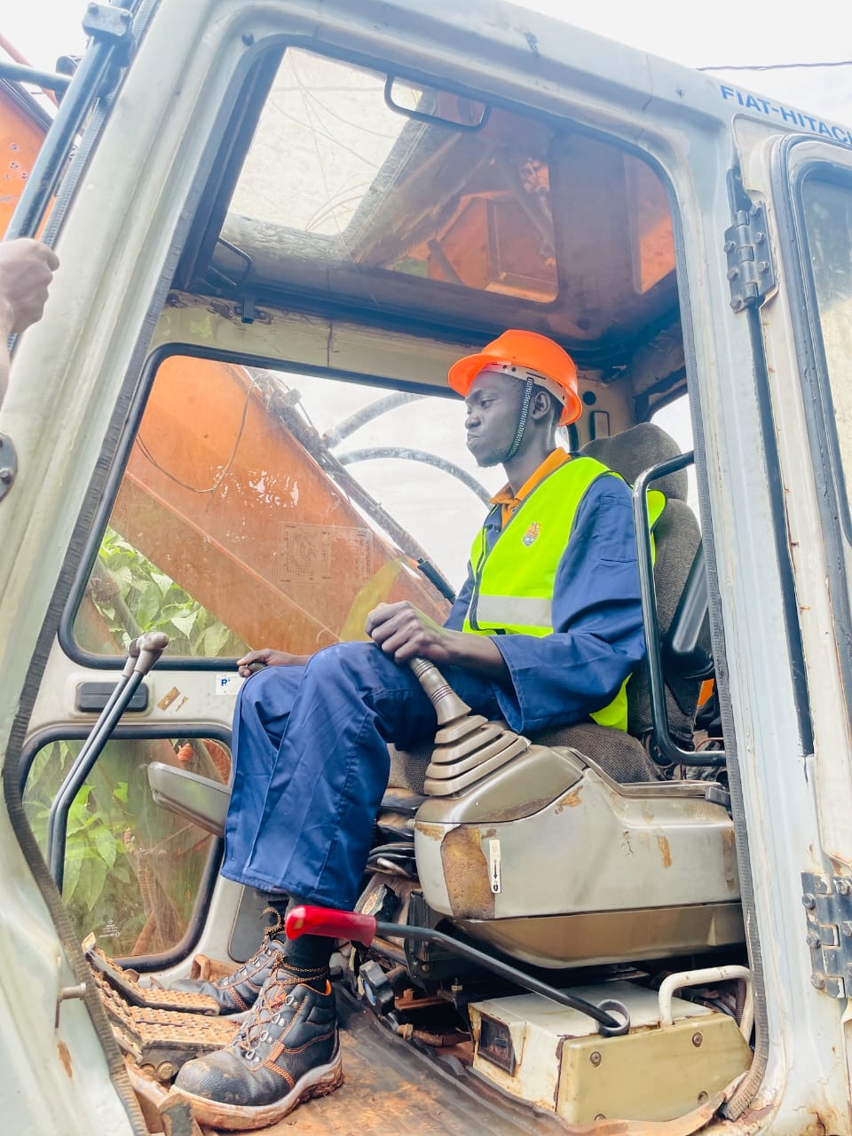 An FHEMTS trainee mastering precise way of operating an excavator