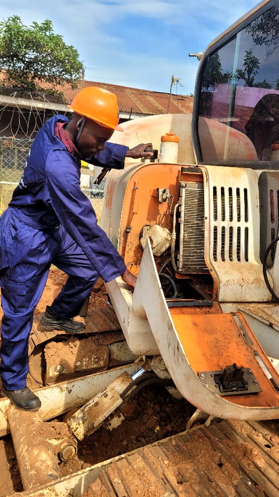 A trainee following up his maintenance schedule